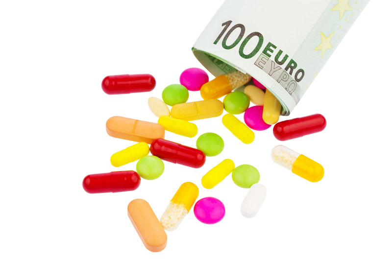 Enlarged view: Pills folling out of 100 Euro bill